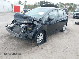 2016 Honda Fit LX with VIN JHMGK5H5XGX019435, listed as a IAAI auction lot 42009756 with 71,757 mi miles and . Bid and sale history available at DreamBid. Image 2.