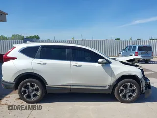 2018 Honda CR-V Touring with VIN 2HKRW2H92JH662753, listed as a IAAI auction lot 39538586 with 83,202 mi miles. Bid and sale history available at carsss.com. Image 14.
