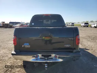 2003 Ford F-150 XLT with VIN 1FTRW07L73KA28876, listed as a Copart auction lot 49319565 with 290,880 mi miles and Salvage Title. Bid and sale history available at carsss.com. Image 6.
