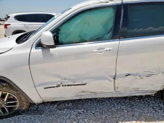 2019 Jeep Grand Cherokee Laredo E with VIN 1C4RJEAG0KC603870, listed as a Copart auction lot 60142575 with Not provided miles and Salvage title. Bid and sale history available at DreamBid. Image 7.