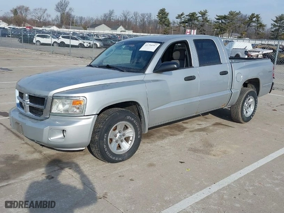 2008 Dodge Dakota SLT with VIN 1D7HW48N08S626761, listed as a IAAI auction lot 41794557 with 104195 miles. Bid and sale history available at carsss.com. Image 2.