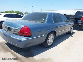 2009 Mercury Grand Marquis LS with VIN 2MEHM75V09X634393, listed as a IAAI auction lot 41993456 with 153,862 mi miles. Bid and sale history available at carsss.com. Image 4.