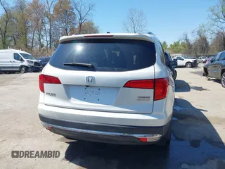 2016 Honda Pilot Touring with VIN 5FNYF6H9XGB005516, listed as a IAAI auction lot 41975049 with 85,217 mi miles. Bid and sale history available at carsss.com. Image 17.