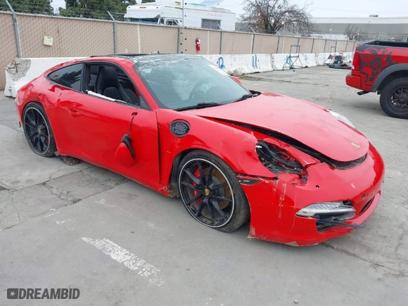 2015 Porsche 911 Carrera S with VIN WP0AB2A94FS125300, listed as a IAAI auction lot 41496595 with 24,921 mi miles. Bid and sale history available at carsss.com. Image 1.