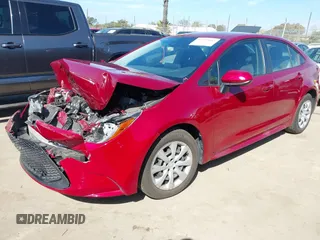 2022 Toyota Corolla LE with VIN JTDEPMAE3NJ232547, listed as a IAAI auction lot 41719602 with 22,071 mi miles. Bid and sale history available at carsss.com. Image 2.