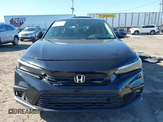 2023 Honda Civic Sedan Touring with VIN 2HGFE1F92PH311721, listed as a IAAI auction lot 41760477 with 15,244 mi miles. Bid and sale history available at carsss.com. Image 11.