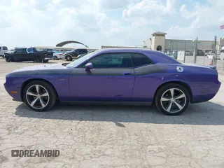 2014 Dodge Challenger R/T z VIN 2C3CDYBT0EH143576, wystawiony jako IAAI lot #42333984 z przebiegiem 189 874 mil mil oraz . Historia ofert i sprzedaży dostępna na DreamBid. Obrazek 14.