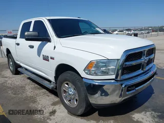2014 Ram 2500 Tradesman z VIN 3C6TR4CT6EG243306, wystawiony jako IAAI lot #41860120 z przebiegiem 101 110 mil mil oraz . Historia ofert i sprzedaży dostępna na DreamBid. Obrazek 1.