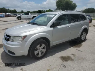 2013 Dodge Journey SE with VIN 3C4PDCAB7DT560630, listed as a Copart auction lot 63582655 with 139,224 mi miles and Salvage title. Bid and sale history available at DreamBid. Image 1.