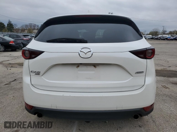 2018 Mazda CX-5 Touring with VIN JM3KFBCM7J0455454, listed as a Copart auction lot 55806695 with 85,694 mi miles and Clean Title. Bid and sale history available at DreamBid. Image 6.