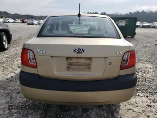 2009 Kia Rio LX with VIN KNADE223296470687, listed as a Copart auction lot 48385925 with 176,400 mi miles and Salvage Title. Bid and sale history available at DreamBid. Image 6.