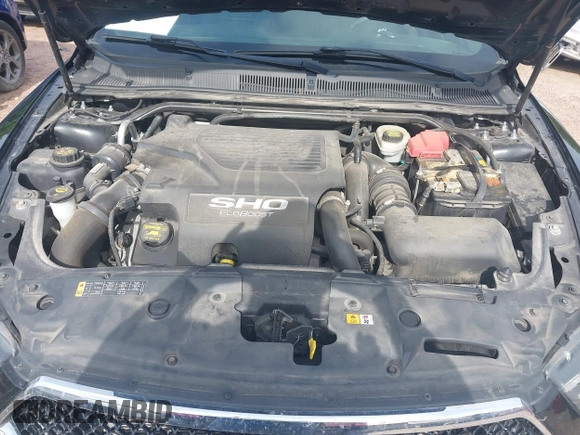 2013 Ford Taurus SHO z VIN 1FAHP2KT8DG155996, wystawiony jako IAAI lot #42709051 z przebiegiem 162 956 mil mil oraz . Historia ofert i sprzedaży dostępna na DreamBid. Obrazek 10.