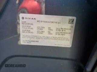2022 Rivian R1T Adventure z VIN 7FCTGAAA5NN014843, wystawiony jako Copart lot #47668545 z przebiegiem 42 640 mil mil oraz Szkody całkowita. Historia ofert i sprzedaży dostępna na DreamBid. Obrazek 13.