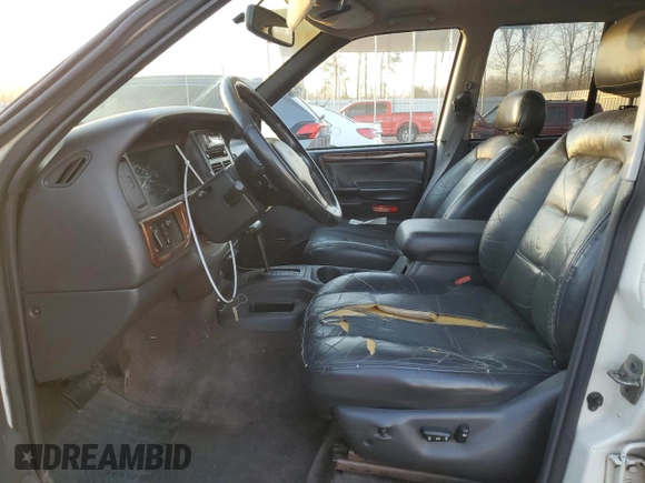 1996 Jeep Grand Cherokee z VIN 1J4FX78S6TC221815, wystawiony jako Copart lot #44000615 z przebiegiem 287 308 mil mil oraz Szkoda całkowita • Salvage title. Historia ofert i sprzedaży dostępna na DreamBid. Obrazek 7.