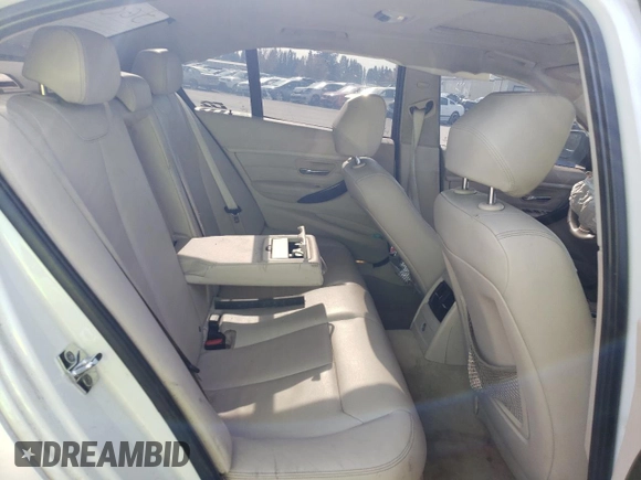 2012 BMW 3 Series 328i with VIN WBA3C1C5XCA696847, listed as a Copart auction lot 53005425 with 143,725 mi miles and Salvage title. Bid and sale history available at DreamBid. Image 10.