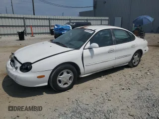 1998 Ford Taurus LX z VIN 1FAFP52U0WA108243, wystawiony jako Copart lot #54952435 z przebiegiem 203 329 mil mil oraz Szkoda całkowita • Salvage title. Historia ofert i sprzedaży dostępna na DreamBid. Obrazek 1.