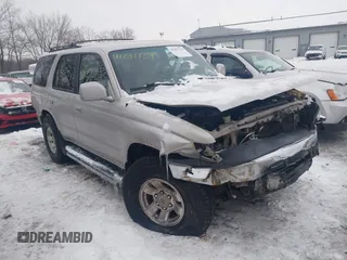 2000 Toyota 4Runner SR5 z VIN JT3GN86RXY0171780, wystawiony jako IAAI lot #41297739 z przebiegiem 172 125 mil mil oraz . Historia ofert i sprzedaży dostępna na DreamBid. Obrazek 1.