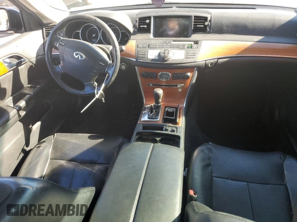 2006 Infiniti M Sport z VIN JNKBY01E56M203302, wystawiony jako Copart lot #85528514 z przebiegiem 199 489 mil mil oraz Szkoda całkowita • Salvage title. Historia ofert i sprzedaży dostępna na DreamBid. Obrazek 8.