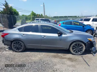 2016 Nissan Altima SR with VIN 1N4AL3AP1GC204037, listed as a IAAI auction lot 42558701 with 82,002 mi miles and . Bid and sale history available at DreamBid. Image 13.