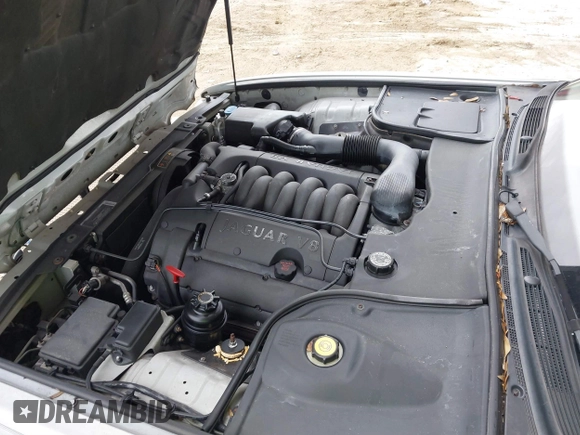 1999 Jaguar XJ with VIN SAJHX1043XC856474, listed as a IAAI auction lot 41626649 with 103,266 mi miles and . Bid and sale history available at DreamBid. Image 10.