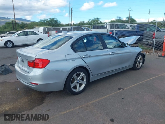 2012 BMW 3 Series 328i with VIN WBA3A5G52CNN65587, listed as a IAAI auction lot 40257554 with 89,445 mi miles and . Bid and sale history available at DreamBid. Image 4.