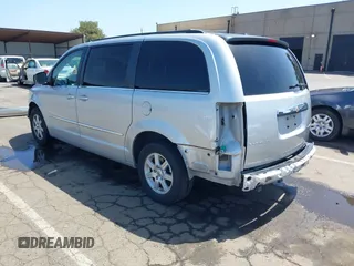2010 Chrysler Town & Country Touring with VIN 2A4RR5D11AR346489, listed as a IAAI auction lot 42102358 with 150,860 mi miles. Bid and sale history available at carsss.com. Image 3.