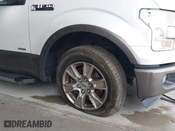 2015 Ford F-150 XL with VIN 1FTEW1CG2FKE72989, listed as a IAAI auction lot 41282621 with 83,119 mi miles and . Bid and sale history available at DreamBid. Image 6.