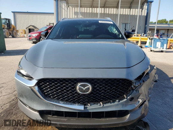 2023 Mazda CX-30 S Carbon Edition with VIN 3MVDMBCM1PM553374, listed as a Copart auction lot 62080975 with 51,527 mi miles and Salvage title. Bid and sale history available at DreamBid. Image 5.