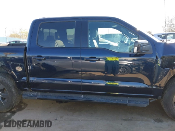 2022 Ford F-150 Lightning Pro z VIN 1FT6W1EV8NWG04113, wystawiony jako IAAI lot #41765532 z przebiegiem 48 990 mil mil oraz . Historia ofert i sprzedaży dostępna na DreamBid. Obrazek 13.