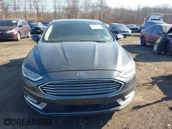 2017 Ford Fusion SE z VIN 3FA6P0HDXHR321008, wystawiony jako IAAI lot #41620779 z przebiegiem 110 116 mil mil oraz . Historia ofert i sprzedaży dostępna na DreamBid. Obrazek 12.