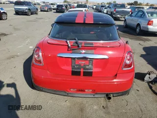 2012 MINI Cooper Coupe with VIN WMWSX1C5XCT163790, listed as a Copart auction lot 73148734 with 144,323 mi miles and Salvage Title. Bid and sale history available at carsss.com. Image 6.