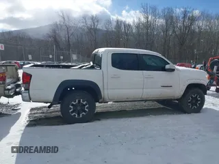 2019 Toyota Tacoma SR z VIN 5TFCZ5AN9KX178090, wystawiony jako IAAI lot #41155337 z przebiegiem 115 265 mil mil oraz . Historia ofert i sprzedaży dostępna na DreamBid. Obrazek 13.