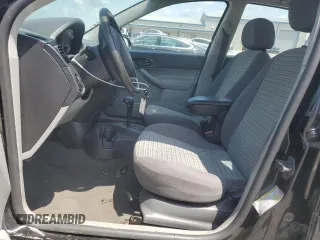 2006 Ford Focus S with VIN 1FAFP34N76W246035, listed as a Copart auction lot 61985015 with 196,498 mi miles and Salvage title. Bid and sale history available at DreamBid. Image 7.