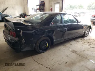 1997 Nissan Skyline z VIN HR33101590, wystawiony jako Copart lot #68650354 z przebiegiem 76 082 mil mil oraz Szkoda całkowita • Salvage title. Historia ofert i sprzedaży dostępna na DreamBid. Obrazek 3.