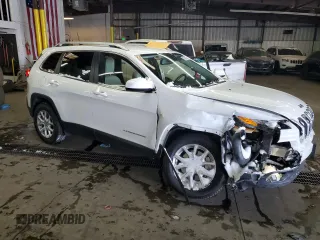 2017 Jeep Cherokee Latitude with VIN 1C4PJMCS7HW555326, listed as a Copart auction lot 87687345 with 89,717 mi miles and Salvage title. Bid and sale history available at DreamBid. Image 4.