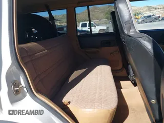 1997 Jeep Cherokee SE with VIN 1J4FJ28S7VL553270, listed as a IAAI auction lot 41825524 with 157,015 mi miles. Bid and sale history available at carsss.com. Image 8.