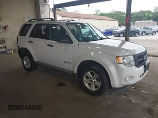 2009 Ford Escape Hybrid with VIN 1FMCU59399KC34999, listed as a IAAI auction lot 42515815 with 201,130 mi miles and . Bid and sale history available at DreamBid. Image 1.