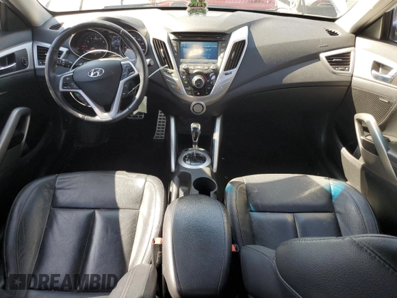 2015 Hyundai Veloster z VIN KMHTC6ADXFU222793, wystawiony jako Copart lot #57861415 z przebiegiem 98 318 mil mil oraz Szkoda całkowita • Salvage title. Historia ofert i sprzedaży dostępna na DreamBid. Obrazek 8.
