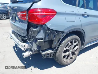 2021 BMW X1 sDrive28i z VIN WBXJG7C02M5T37169, wystawiony jako IAAI lot #42226396 z przebiegiem 48 603 mil mil oraz . Historia ofert i sprzedaży dostępna na DreamBid. Obrazek 18.