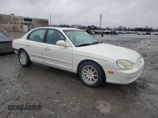 1999 Hyundai Sonata GLS with VIN KMHWF35VXXA049804, listed as a Copart auction lot 44175995 with 123,322 mi miles and Salvage Title. Bid and sale history available at carsss.com. Image 4.