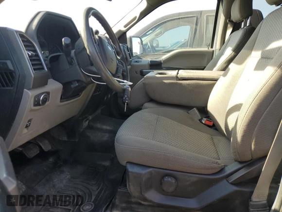 2020 Ford F-150 XL z VIN 1FTFW1E41LKD20849, wystawiony jako Copart lot #55774935 z przebiegiem 171 239 mil mil oraz Czysty tytuł • Clean title. Historia ofert i sprzedaży dostępna na DreamBid. Obrazek 7.