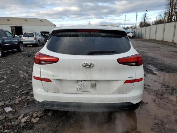 2019 Hyundai Tucson SE with VIN KM8J2CA48KU980022, listed as a Copart auction lot 89057495 with 36,813 mi miles and Salvage Title. Bid and sale history available at carsss.com. Image 6.