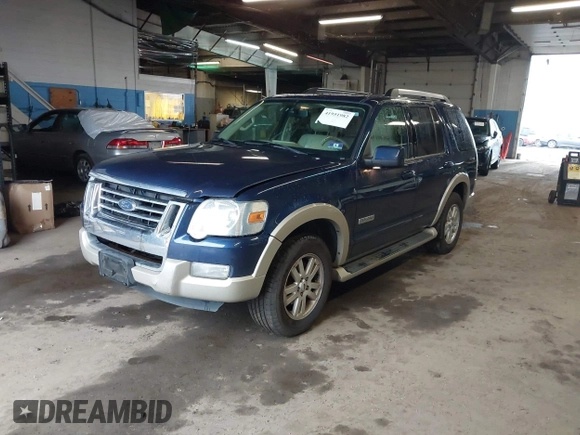 2006 Ford Explorer Eddie Bauer z VIN 1FMEU748X6UB09159, wystawiony jako IAAI lot #41951982 z przebiegiem 209 730 mil mil oraz . Historia ofert i sprzedaży dostępna na DreamBid. Obrazek 2.