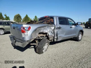 2012 Toyota Tundra 4WD Truck with VIN 5TFDM5F14CX035946, listed as a Copart auction lot 69534764 with 33,668 mi miles and Salvage Title. Bid and sale history available at carsss.com. Image 3.