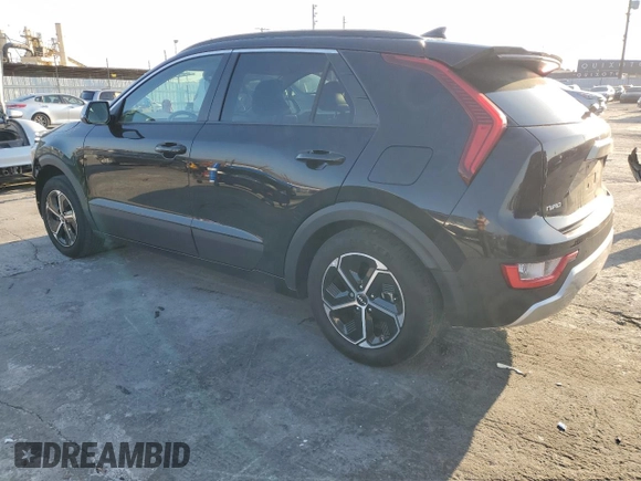 2023 Kia Niro EX with VIN KNDCR3LE9P5076681, listed as a Copart auction lot 42522465 with 56,896 mi miles and Salvage Title. Bid and sale history available at carsss.com. Image 2.