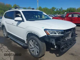 2021 Volkswagen Atlas SEL with VIN 1V2BR2CA5MC523418, listed as a IAAI auction lot 42136929 with 73,037 mi miles and . Bid and sale history available at DreamBid. Image 1.