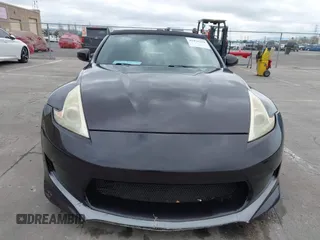 2010 Nissan 370Z Touring with VIN JN1AZ4FH3AM301311, listed as a IAAI auction lot 41976379 with 51,347 mi miles. Bid and sale history available at carsss.com. Image 12.