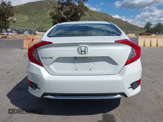 2020 Honda Civic Sedan LX with VIN 19XFC2F64LE201551, listed as a IAAI auction lot 41939055 with 67,461 mi miles. Bid and sale history available at carsss.com. Image 16.