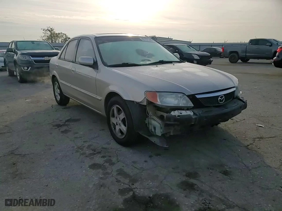 2002 Mazda Protege DX with VIN JM1BJ225621576389, listed as a Copart auction lot 42727745 with 185,042 mi miles and Salvage Title. Bid and sale history available at carsss.com. Image 10.