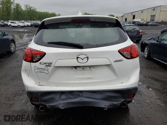 2016 Mazda CX-5 Sport z VIN JM3KE4BY2G0802376, wystawiony jako Copart lot #55976585 z przebiegiem 112 600 mil mil oraz Szkoda całkowita • Salvage title. Historia ofert i sprzedaży dostępna na DreamBid. Obrazek 6.